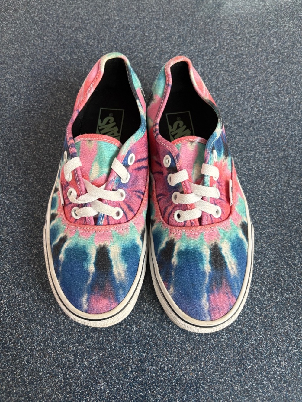 Vans blue and pink tie dye, lace up sneakers.